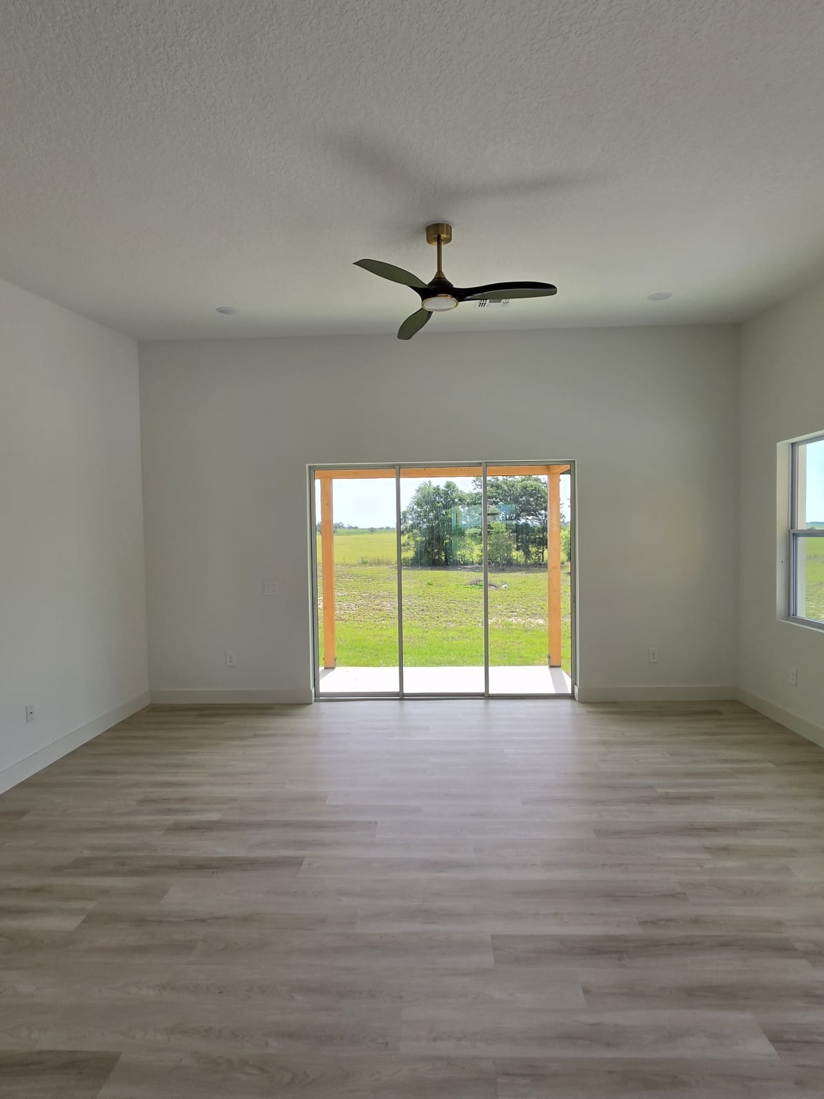 Brand-New 4-Bedroom Home on 2.11 Acres with Pole Barn Near Ocala | Living Quarters | For Sale