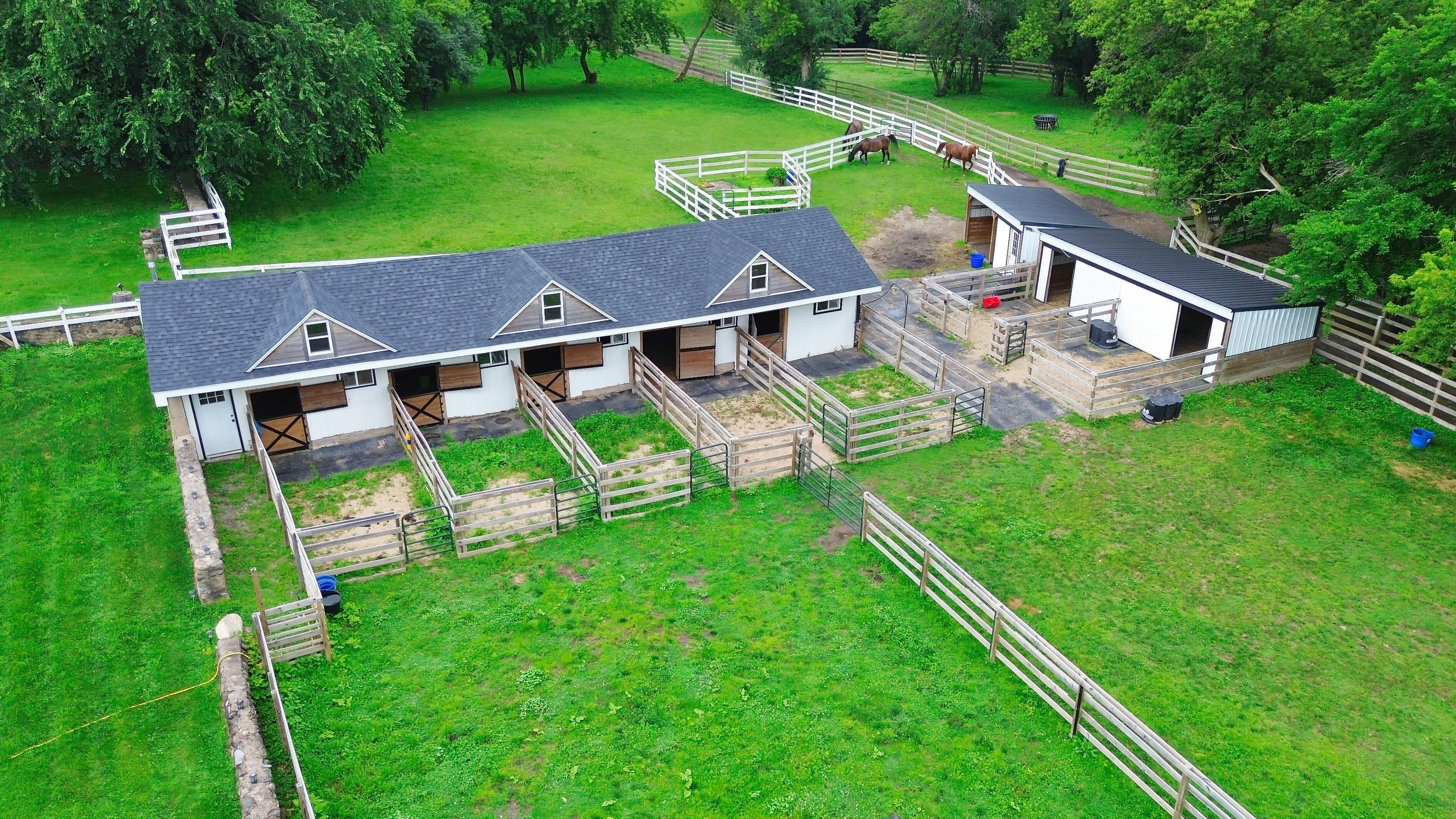 LUXURY EQUESTRIAN ESTATE---owner financing available! | Living Quarters + Stables | For Sale