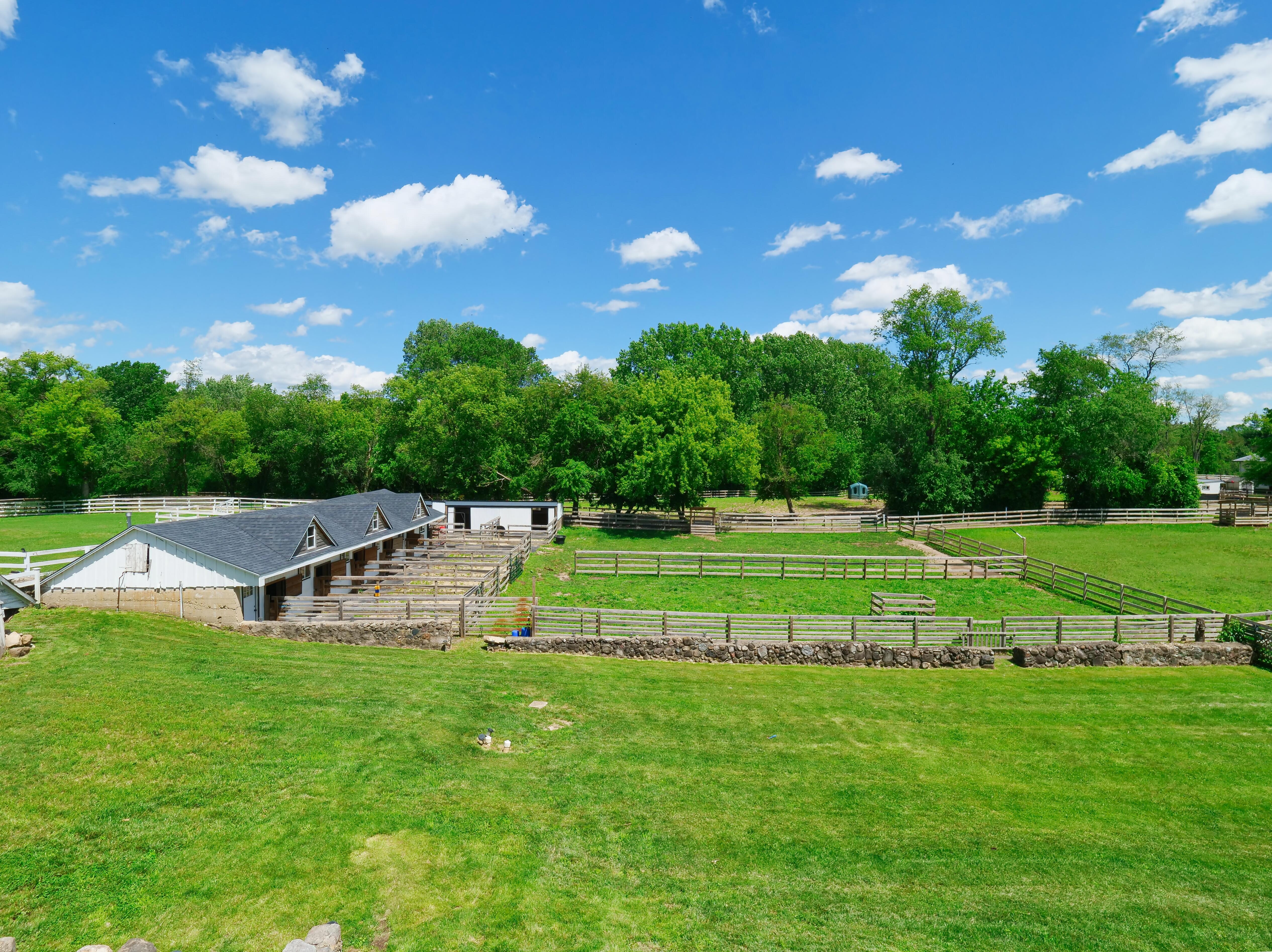 LUXURY EQUESTRIAN ESTATE---owner financing available! | Living Quarters + Stables | For Sale