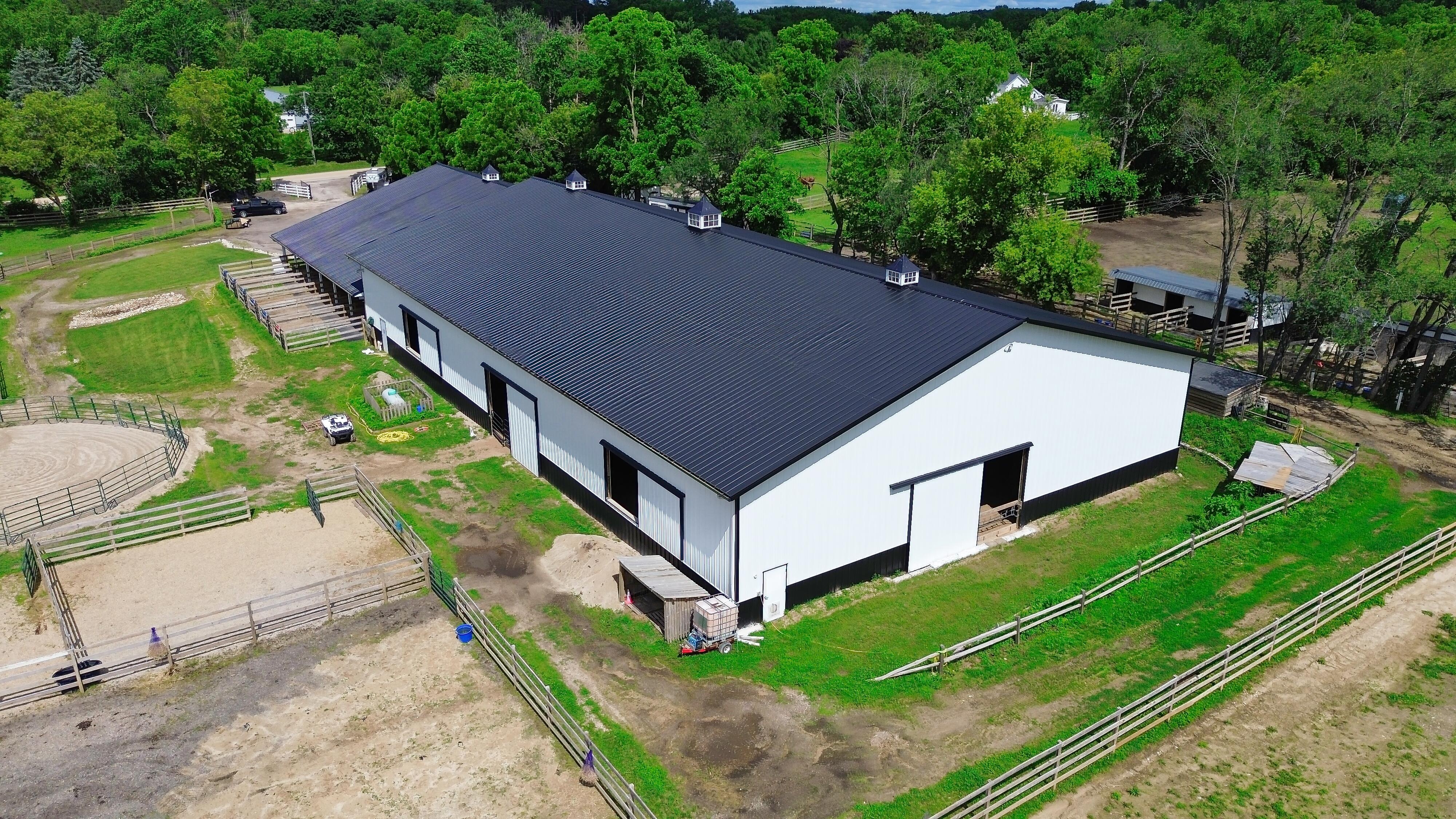 LUXURY EQUESTRIAN ESTATE---owner financing available! | Living Quarters + Stables | For Sale