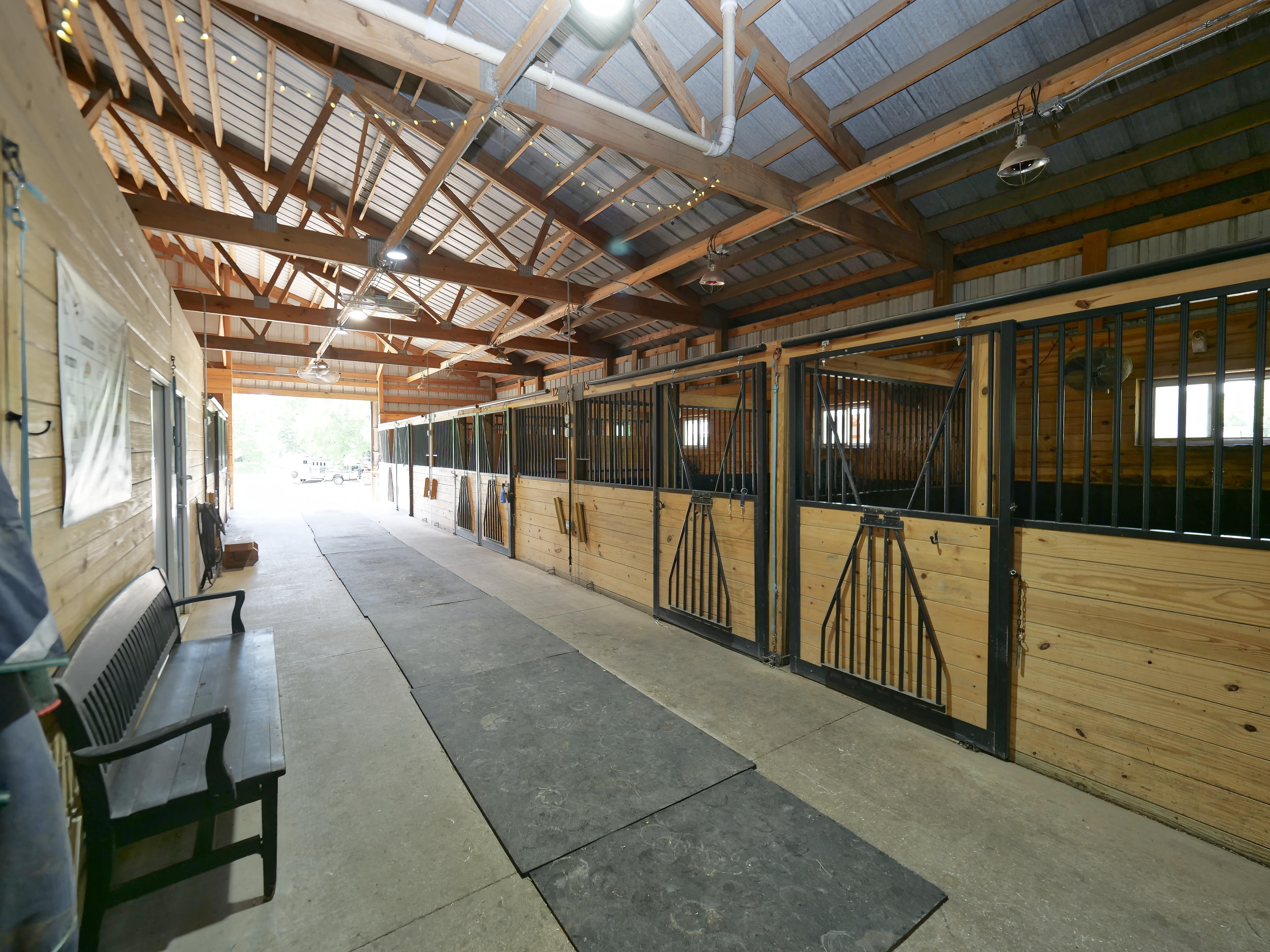 LUXURY EQUESTRIAN ESTATE---owner financing available! | Living Quarters + Stables | For Sale