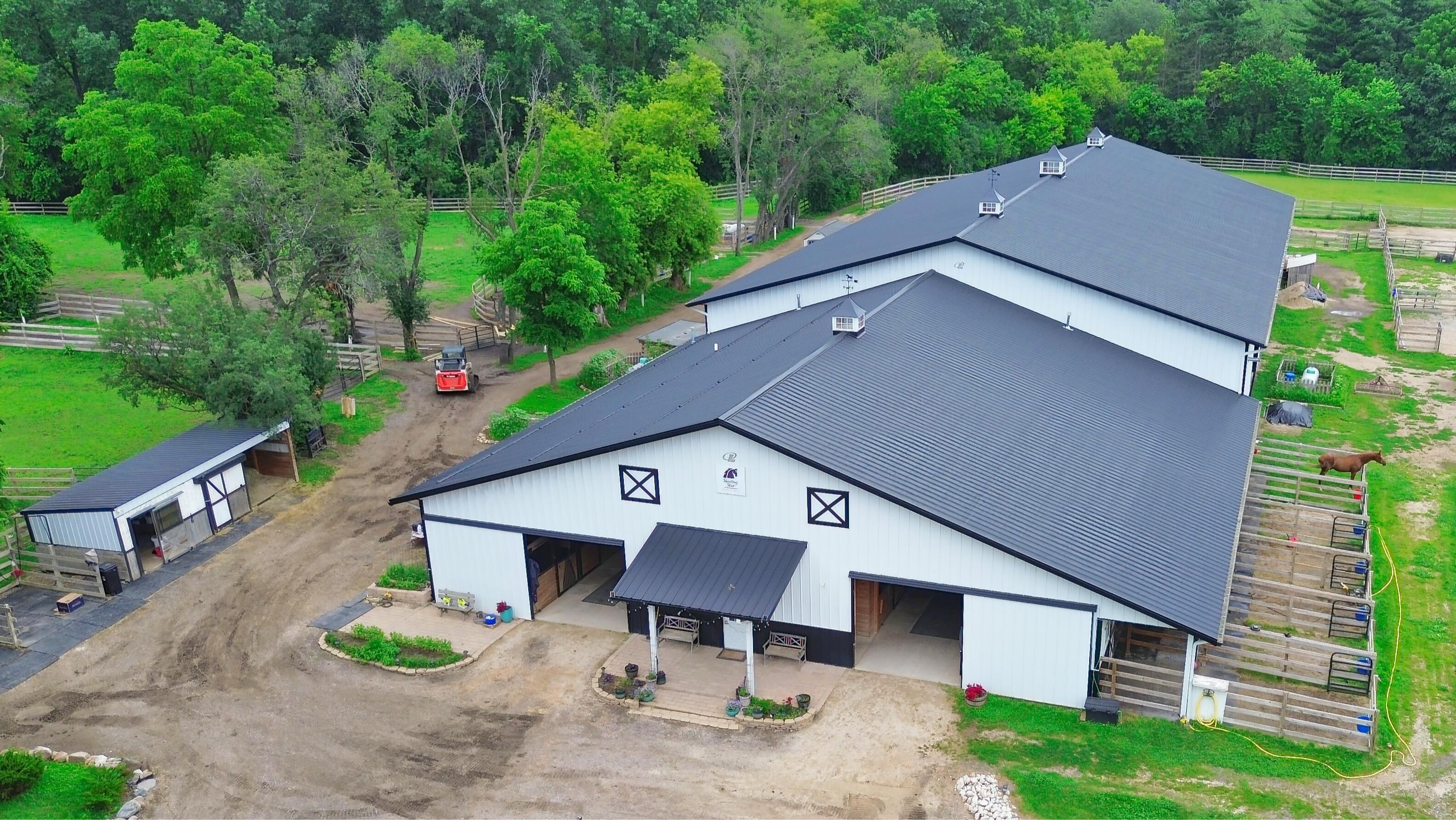LUXURY EQUESTRIAN ESTATE---owner financing available! | Living Quarters + Stables | For Sale