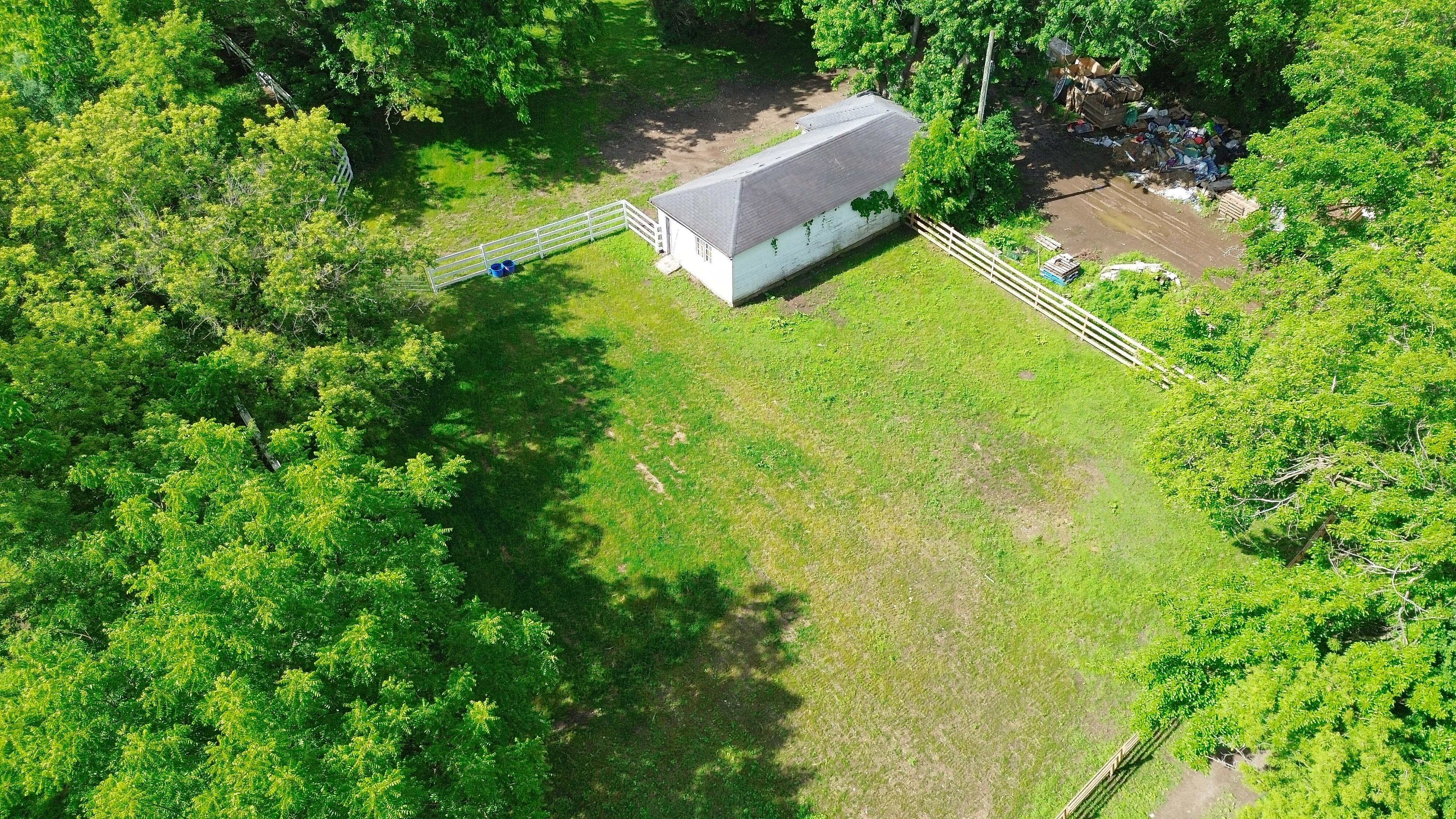 LUXURY EQUESTRIAN ESTATE---owner financing available! | Living Quarters + Stables | For Sale
