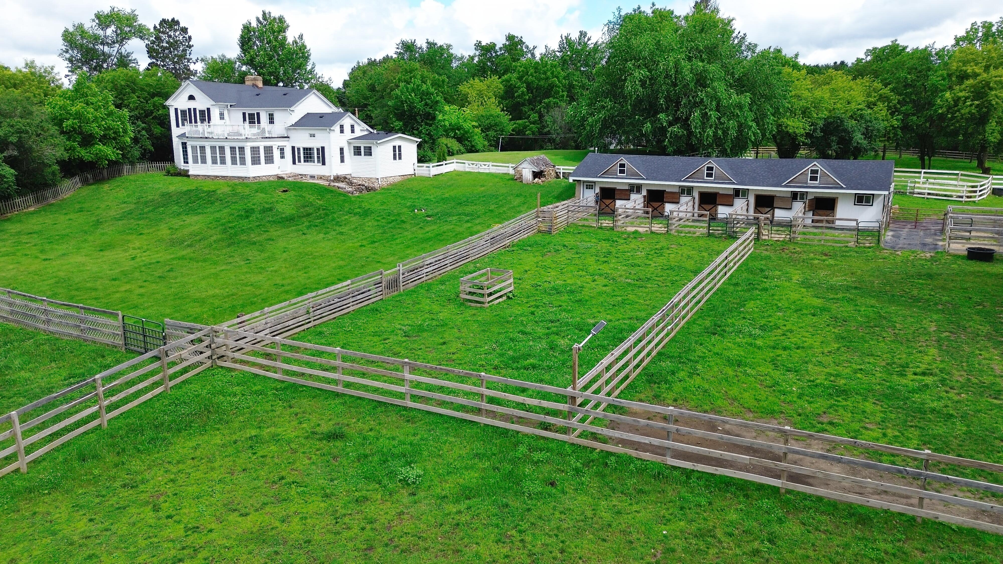 LUXURY EQUESTRIAN ESTATE---owner financing available! | Living Quarters + Stables | For Sale