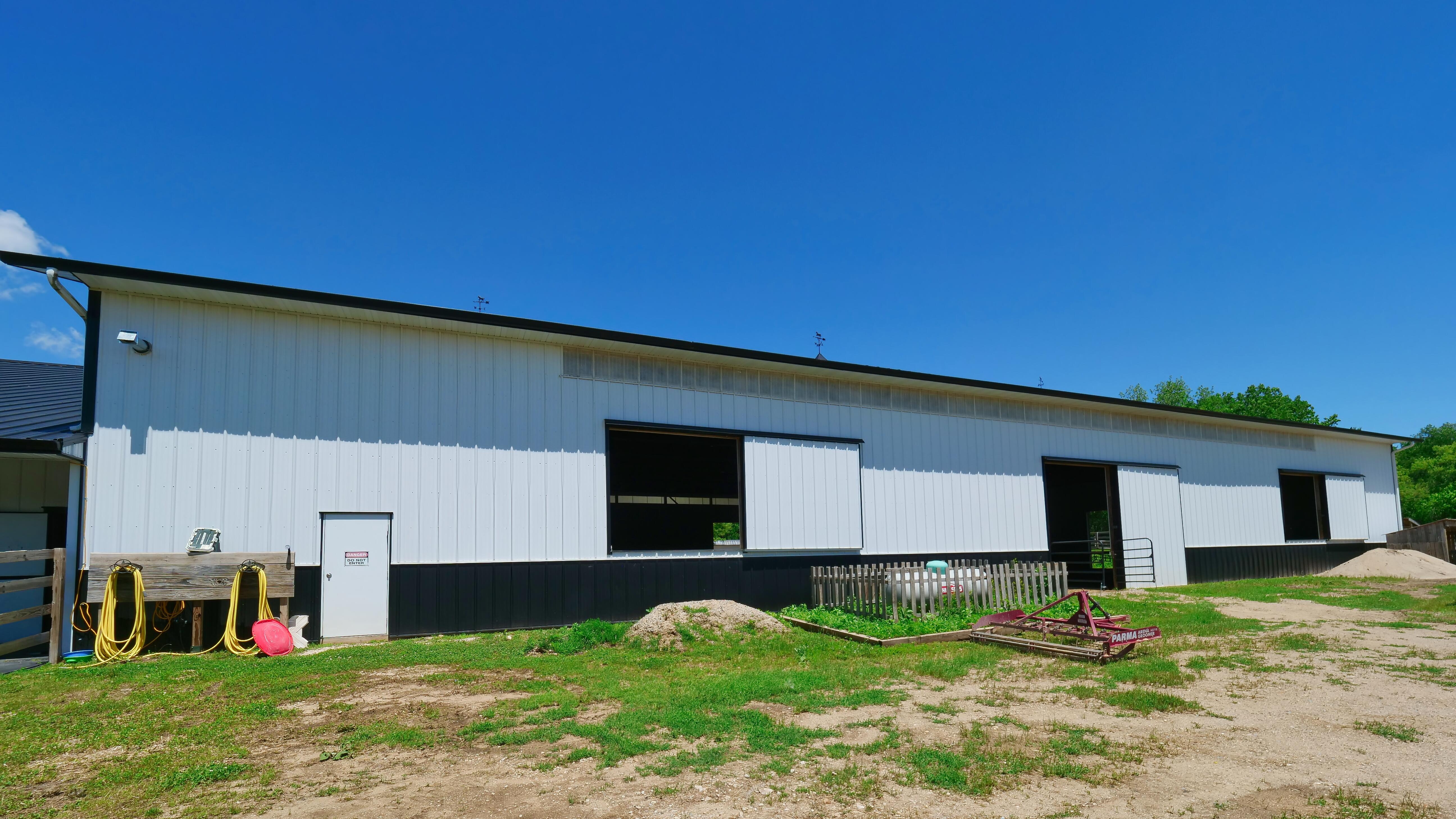 LUXURY EQUESTRIAN ESTATE---owner financing available! | Living Quarters + Stables | For Sale