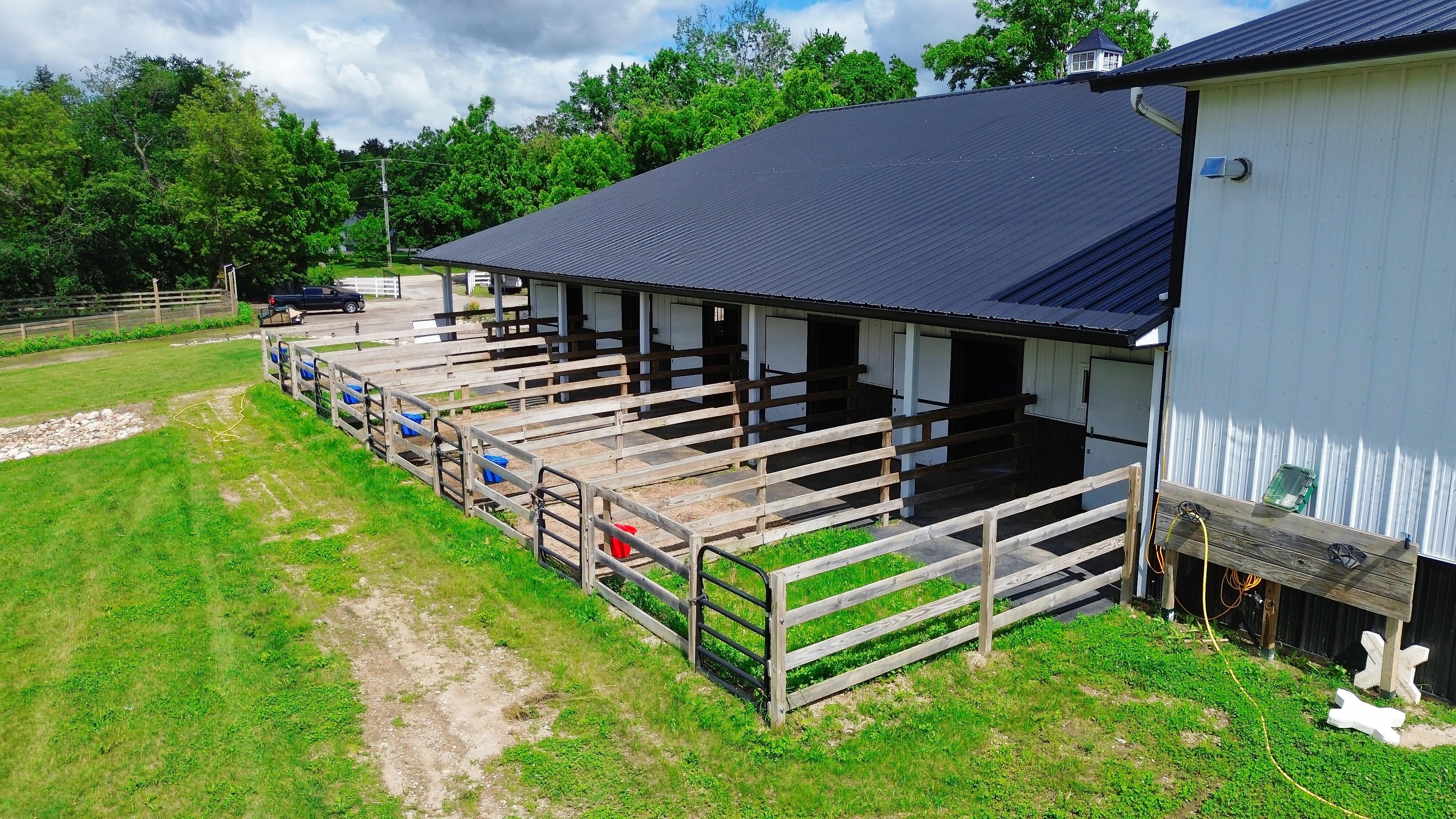 LUXURY EQUESTRIAN ESTATE---owner financing available! | Living Quarters + Stables | For Sale