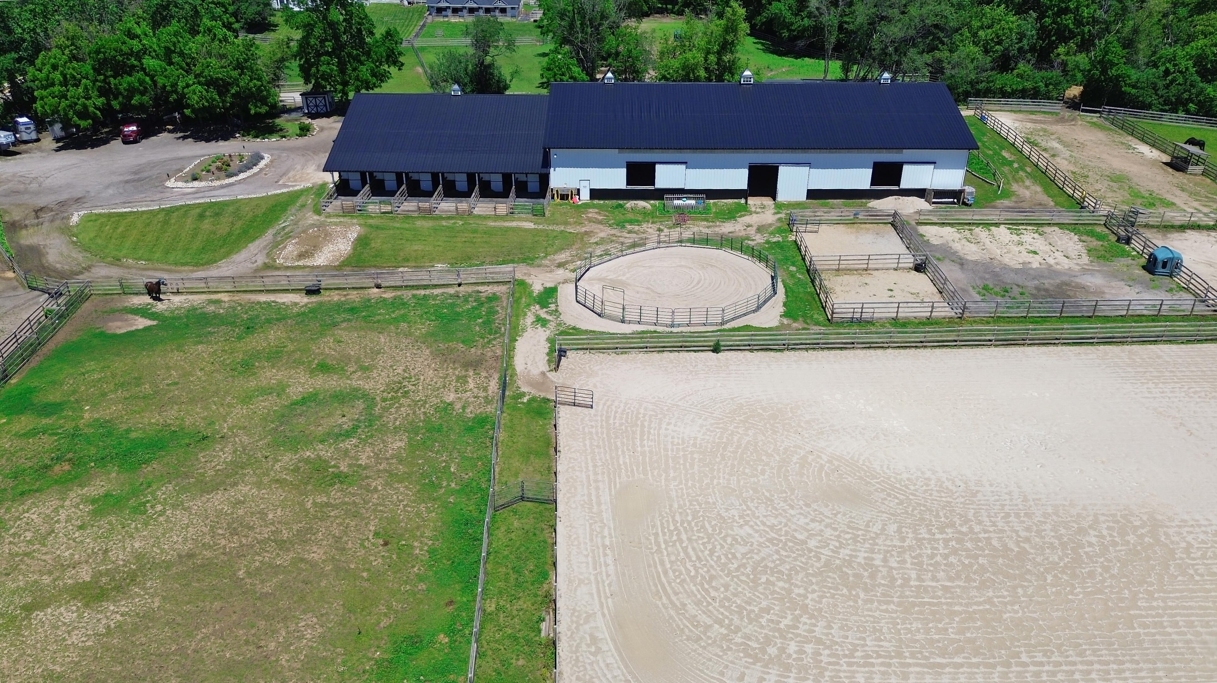 LUXURY EQUESTRIAN ESTATE---owner financing available! | Living Quarters + Stables | For Sale