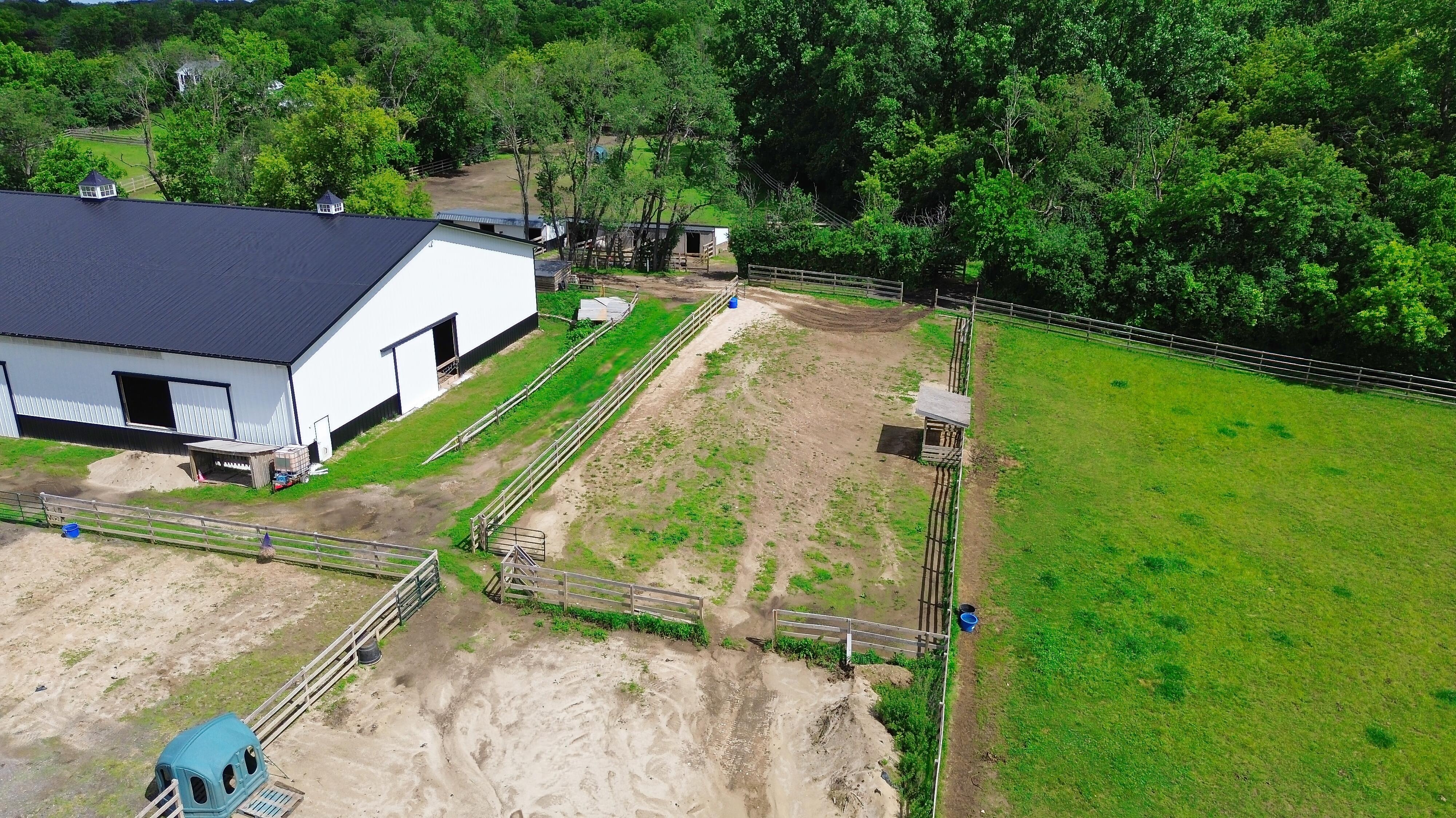 LUXURY EQUESTRIAN ESTATE---owner financing available! | Living Quarters + Stables | For Sale