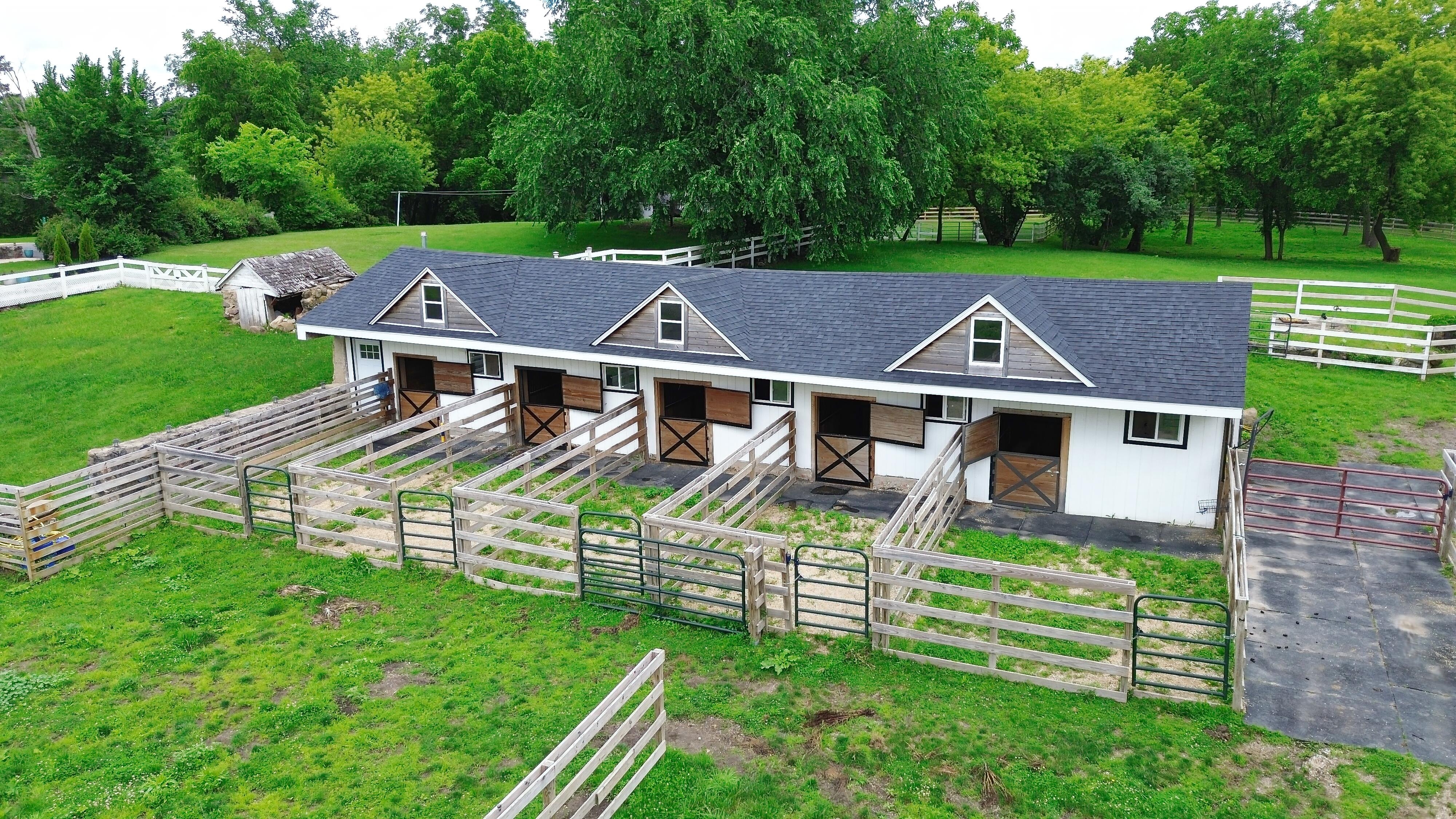 LUXURY EQUESTRIAN ESTATE---owner financing available! | Living Quarters + Stables | For Sale